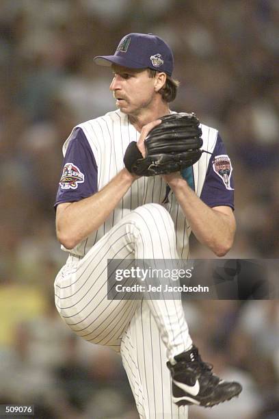 Randy Johnson the Arizona Diamondbacks pitches during game six of the World Series against the New York Yankees at Bank One Ballpark in Phoenix,...