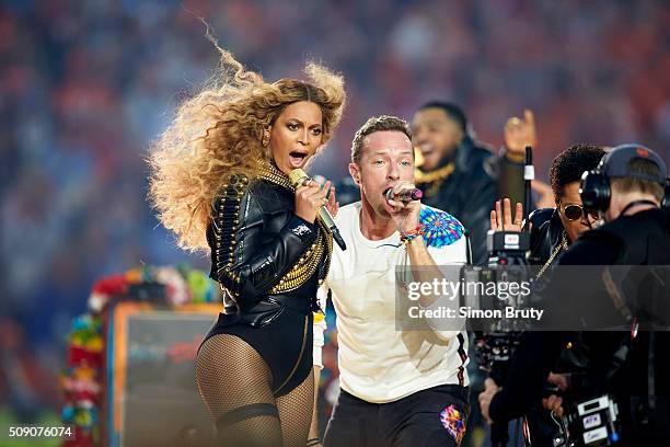 Super Bowl 50: Celebrity singers Chris Martin of Coldplay and Beyonce performing during halftime show of Denver Broncos vs Carolina Panthers game at...