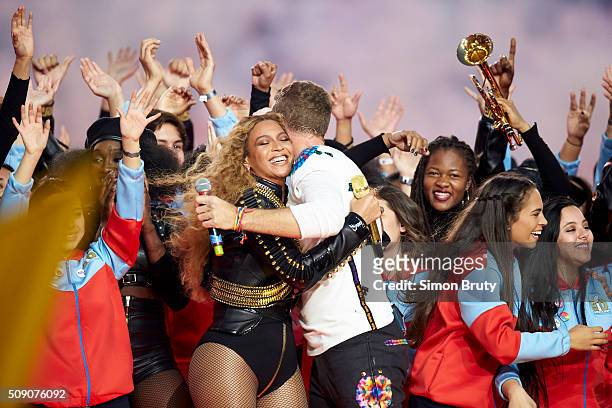 Super Bowl 50: Celebrity singers Chris Martin of Coldplay and Beyonce performing during halftime show of Denver Broncos vs Carolina Panthers game at...