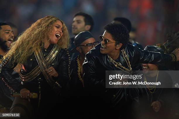 Super Bowl 50: Celebrity singers Beyonce and Bruno Mars performing during halftime show of Denver Broncos vs Carolina Panthers game at Levi's...