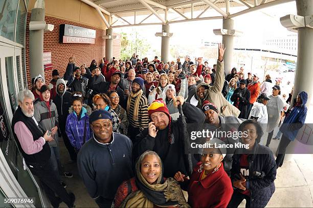 Fans arrive early at the entrance gates prior to a game between the Connecticut Huskies and the South Carolina Gamecocks at Colonial Life Arena on...