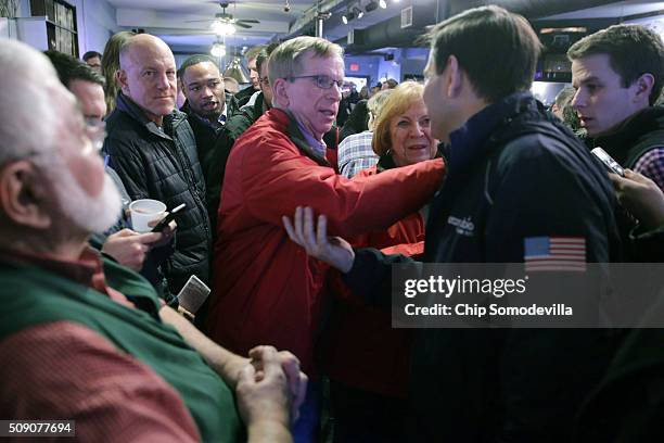 New York Times Magazine journalist Mark Leibovich watches as Steve Scheffler , Republican National Committeeman from Iowa, talks with Republican...