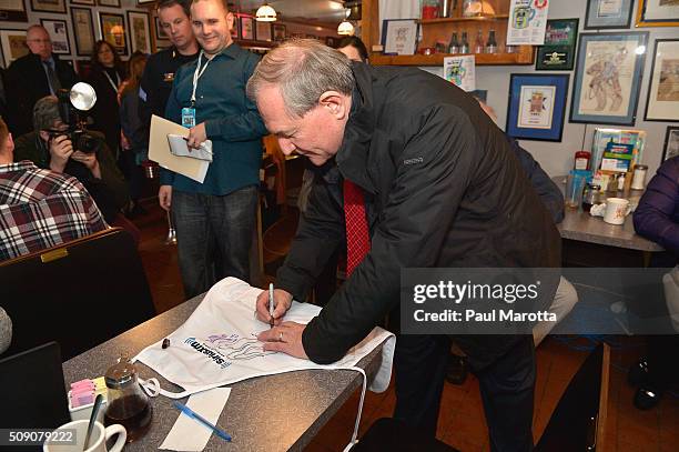 Former Virginia Governor and presidential candidate Jim Gilmore greets diners at SiriusXM Broadcasts' New Hampshire Primary Coverage Live From Iconic...
