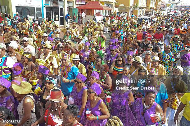 Members of the band 'Ship Ahoy Africa' presented by Trinidad All Stars Steel Orchestra, perform during the Parade of Bands on Charlotte Street as...