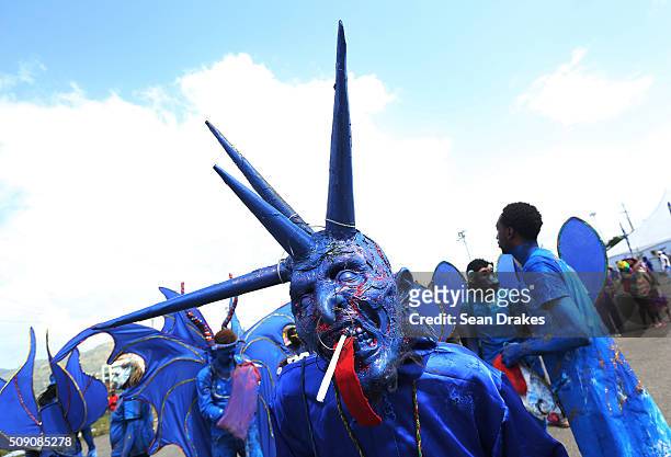 Blue Devil from the band 'Devils on the Loose' prepares to compete in the Parade of Bands in the Queen's Park Savannah as part of Trinidad and Tobago...