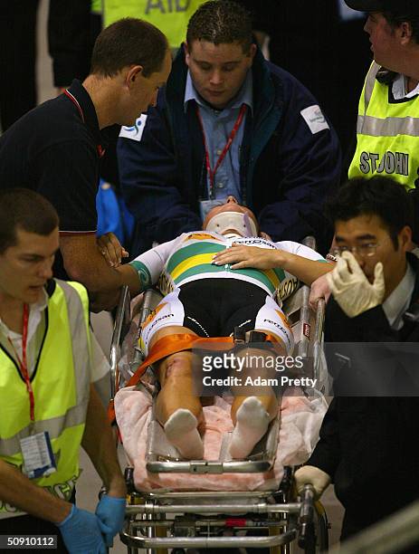 Rochelle Gilmore of Australia is taken to hospital after a crash in the women's scratch race during day five of the UCI Track Cycling World...