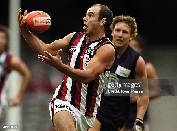 Brent Guera for the Saints in action during the round ten AFL match between The Carlton Blues and The St.Kilda Saints on May 30, 2004 at the Telstra...