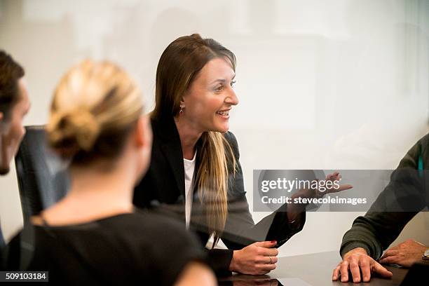 businesswoman leading a meeting. - regional new south wales stock pictures, royalty-free photos & images