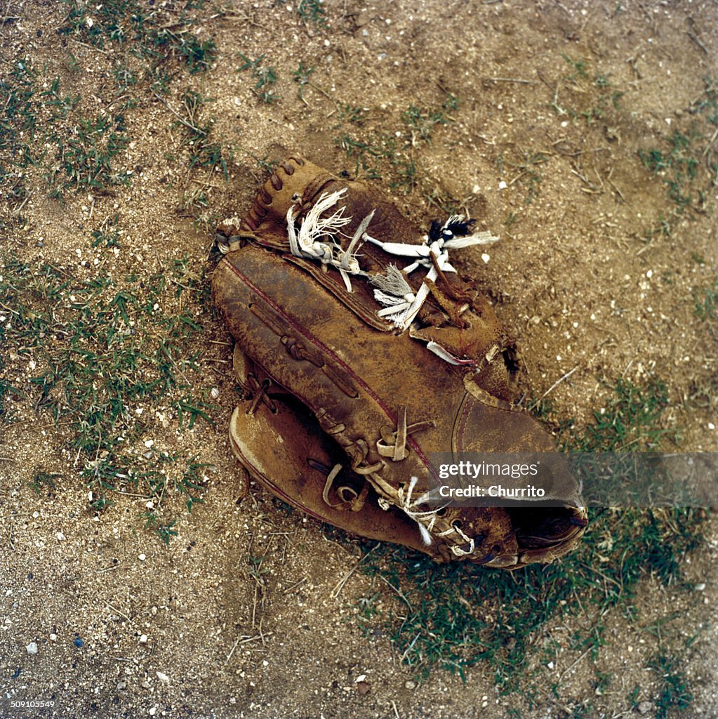 Baseball gloves on ground, Havana, Cuba