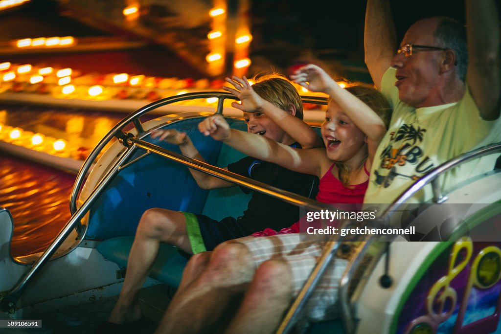 USA, New Jersey, Cape May County, Ocean City, Family on amusement park ride