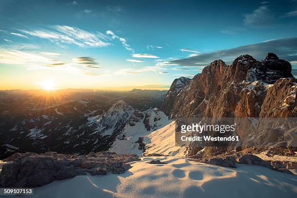austria, salzkammergut, sunset at dachstein mountains - snowfield fotografías e imágenes de stock