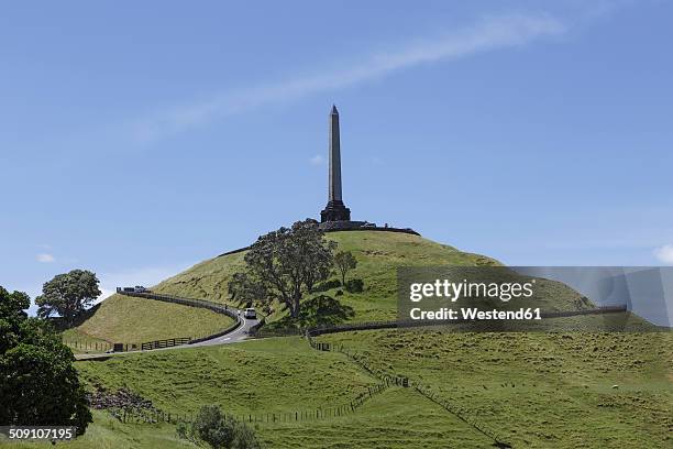 new zealand, view to mount eden with obelisk - mount eden stockfoto's en -beelden