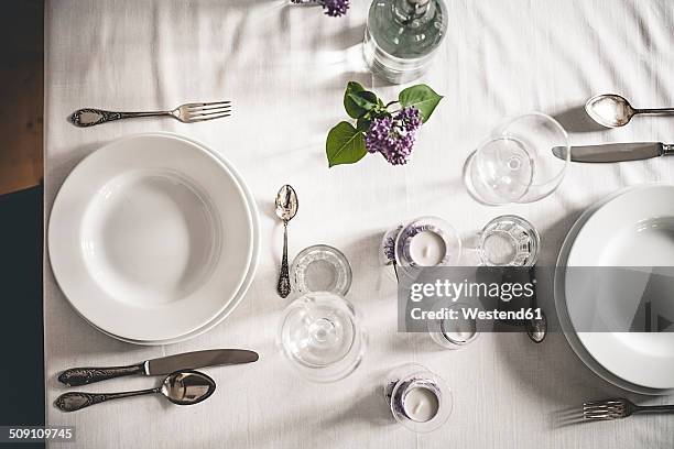 festive laid table with lilac, syringa, view from above - tea light stock pictures, royalty-free photos & images