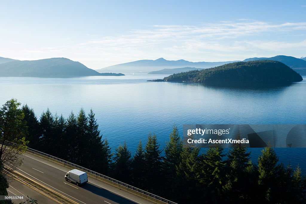 Delivery truck driving along Highway 99, BC, Canada