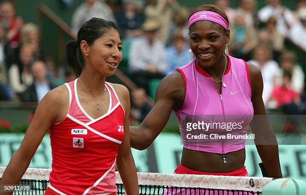 Serena Williams of the USA is congratulated after winning her fourth round match against Shinobu Asagoe of Japan during Day Seven of the 2004 French...