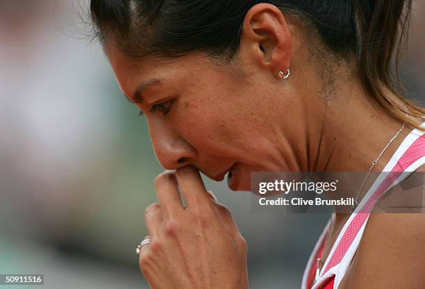 Shinobu Asagoe of Japan in her fourth round match against Serena Williams of the USA during Day Seven of the 2004 French Open Tennis Championship at...