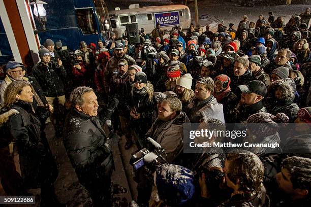 Republican presidential candidate, Ohio Gov. John Kasich speaks to supporters at an election eve rally on February 8, 2016 at Robie's Country Store...