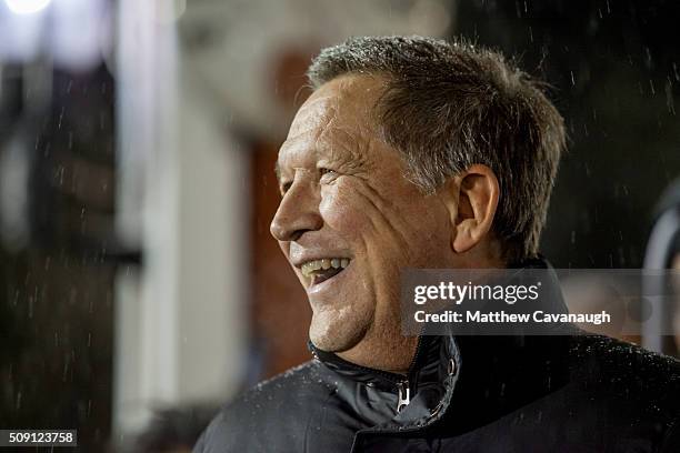 Republican presidential candidate, Ohio Gov. John Kasich smiles during an election eve rally on February 8, 2016 at Robie's Country Store in...