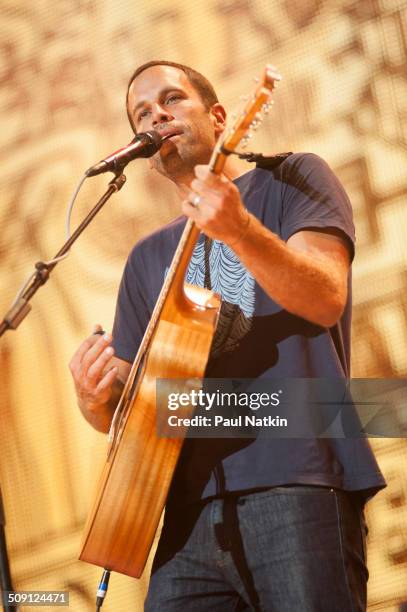 American musician Jack Johnson performs onstage during the Farm Aid benefit concert at Saratoga Performing Arts Cente, Saratoga Springs, New York,...