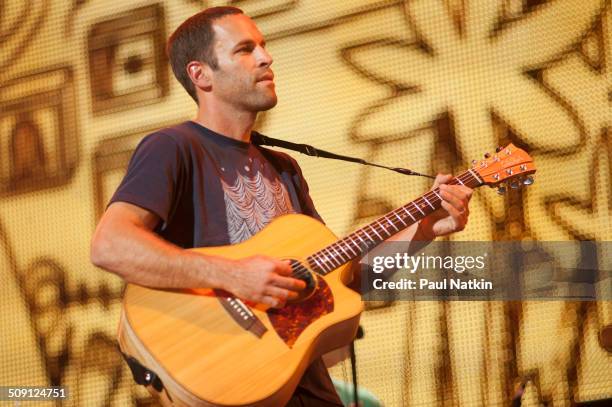 American musician Jack Johnson performs onstage during the Farm Aid benefit concert at Saratoga Performing Arts Cente, Saratoga Springs, New York,...