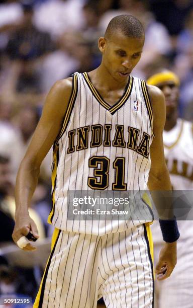 Reggie Miller of the Indiana Pacers walks upcourt in Game five of the Eastern Conference Finals against the Detroit Pistons during the 2004 NBA...