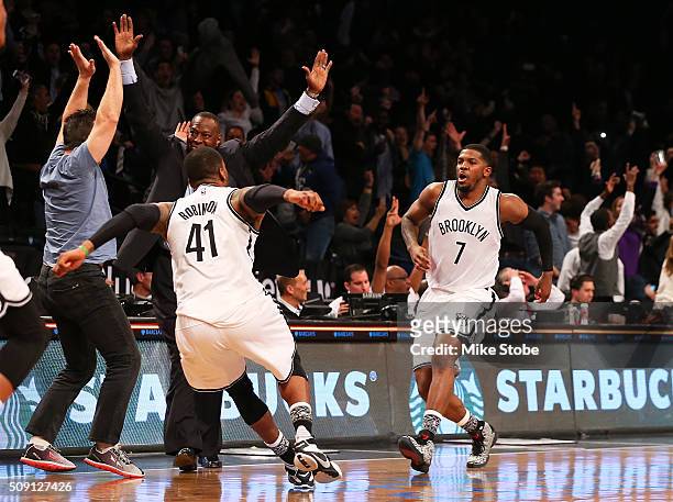 Joe Johnson of the Brooklyn Nets celebrates after hitting the game-winning, three-pointer in the final second to beat the Denver Nuggets at the...