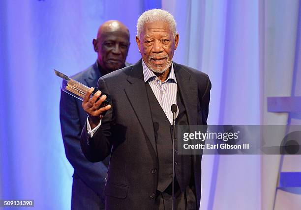 Actor Morgan Freeman accepts the Best Grownup Love Story award for '5 Flights Up' onstage at the AARP's 15th Annual Movies For Grownups Awards at the...