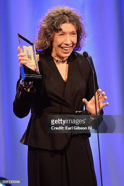 Actress Lily Tomlin, winner of the Best Actress award for 'Grandma,' speaks onstage at AARP's 15th Annual Movies For Grownups Awards at the Beverly...