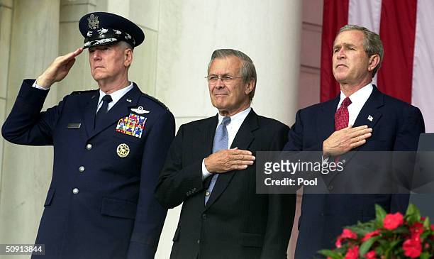 President George W. Bush , Chairman of the Joint Chiefs of Staff, General Richard B. Myers and U.S. Secretary of Defense Donald Rumsfeld watch the...