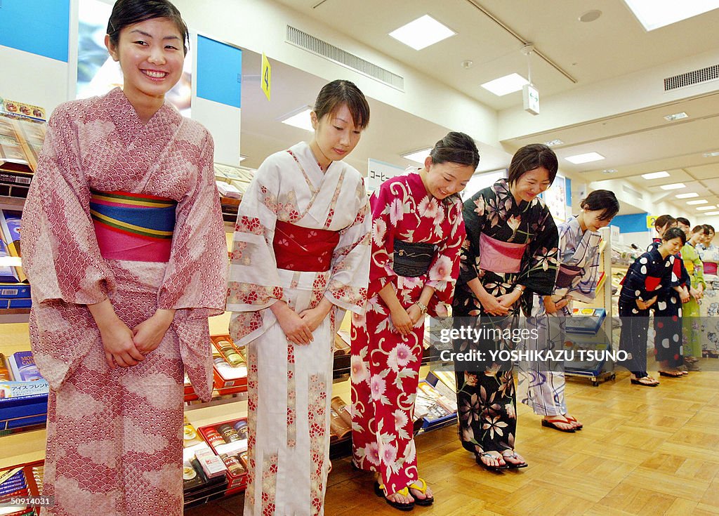 Sales clerks of Tokyo's Mitsukoshi depar