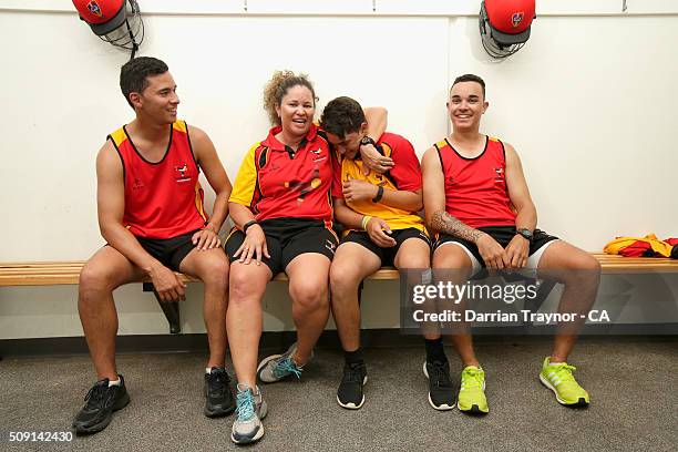 Brothers Ayden McGregor-Baptista, Dylan McGregor-Baptista and Marcus McGregor-Cassady of South Australia pose for a photo with their Team Manager and...