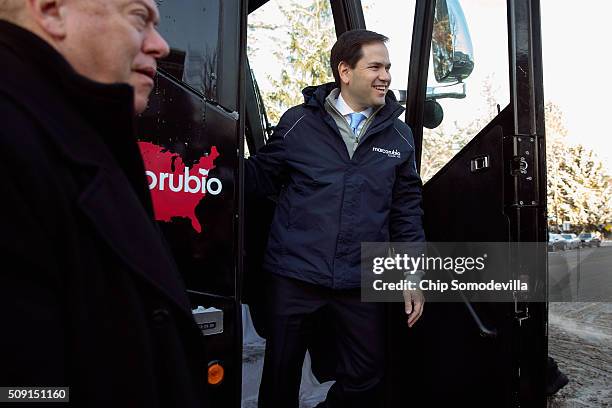 Republican presidential candidate Sen. Marco Rubio steps off his campaign bus outside the polling place at Webster School to thank supporters...