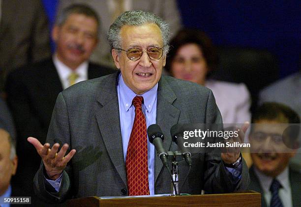 Envoy Lakhdar Brahimi speaks during the Iraqi Interim Government announcement ceremony June 1, 2004 in Baghdad, Iraq. Interim Iraqi Government...