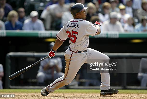 Andruw Jones of the Atlanta Braves bats during the game against the Colorado Rockies in the first game of a double-header at Coors Field on May 1,...