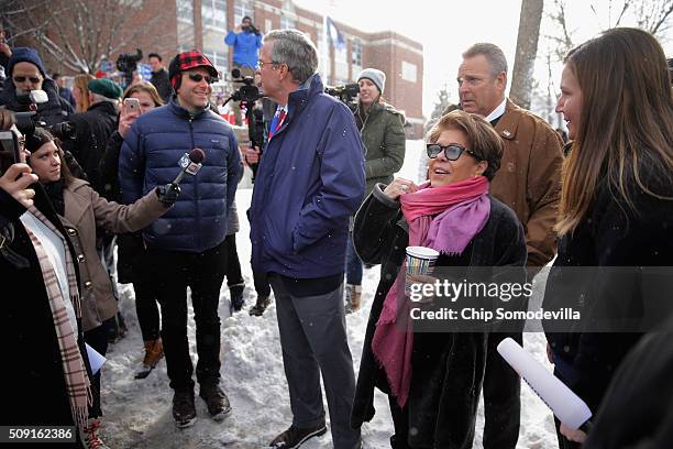 Republican presidential candidate Jeb Bush and his wife Columba Bush thank supporters outside the polling place at Webster School on primary day...