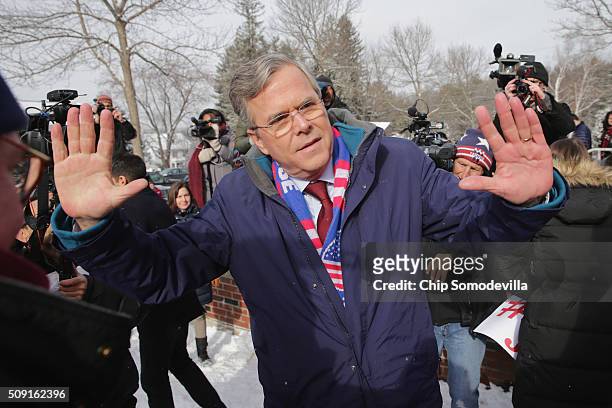 Republican presidential candidate Jeb Bush thanks his supporters outside the polling place at Webster School on primary day February 9, 2016 in...