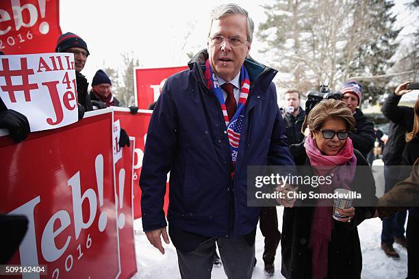 Republican presidential candidate Jeb Bush and his wife Columba Bush thank supporters outside the polling place at Webster School on primary day...