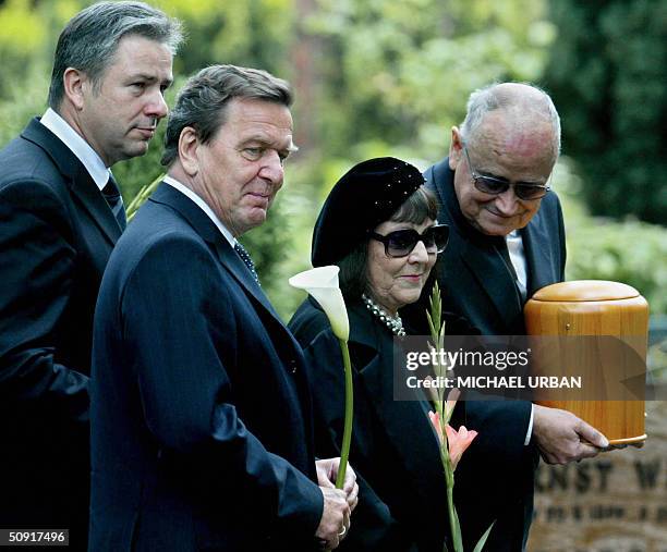 June Newton , the widow of German-born photographer Helmut Newton, attends with German Chancellor Gerhard Schroeder and Berlin's mayor Klaus Wowereit...