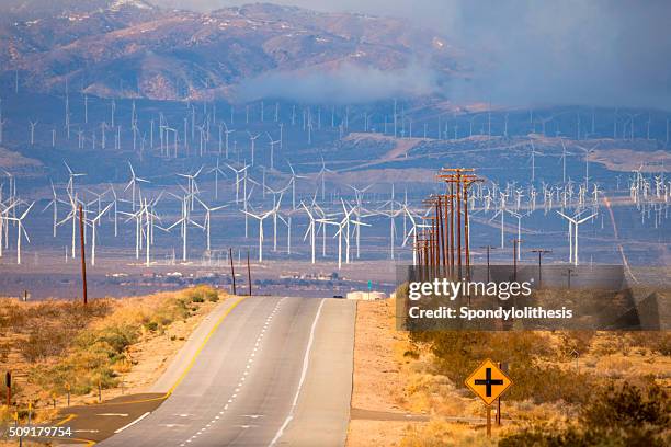 bakersfield wind farm under fog - wind turbine california stock pictures, royalty-free photos & images