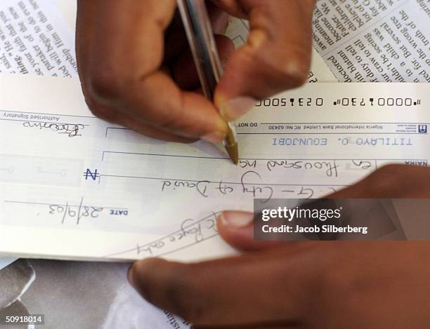 Woman Writecheck 1,116 Writing A Check Stock Photos, High-Res Pictures, and Images ...