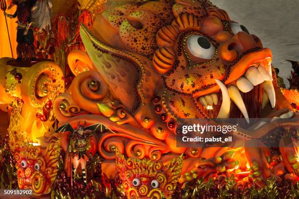 monster dragon red salgueiro float - rio carnival float stock pictures, royalty-free photos & images