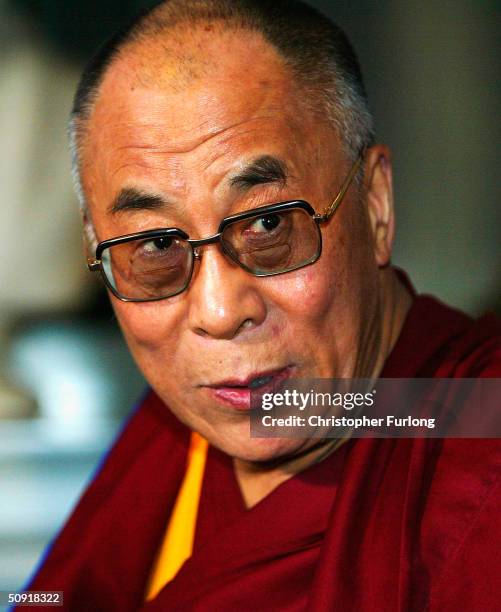 Exiled Tibetan spiritual leader The Dalai Lama arrives to address members of the Scottish Parliament, June 2, 2004 in Edinburgh, Scotland. The Dalai...