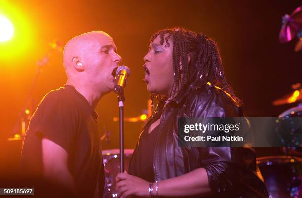 American DJ Moby performs onstage with an unidentified singer, Chicago, Illinois, August 6, 2002.