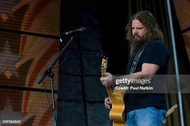 American musician Jamey Johnson performs onstage during the Farm Aid benefit concert at the Verizon Wireless Ampitheater, Maryland Heights, Missouri,...