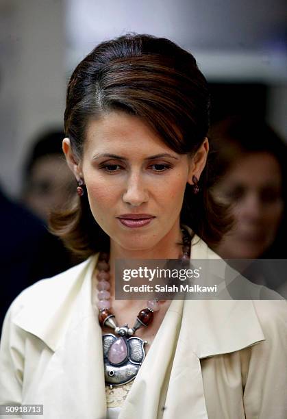 Asmaa al-Assad, wife of Syrian President Bashar al-Assad, looks on as she visits the Spanish Red Cross on June 2, 2004 in Madrid, Spain.