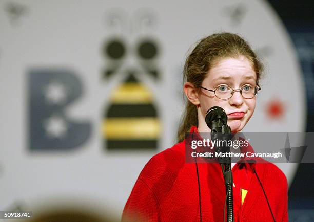 Charlotte Mary Blacklock of Tuxedo Park, New York, reacts to misspelling "synovial" during round three of the National Spelling Bee June 2, 2004 in...