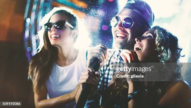 karaoke party. - singing competition stock pictures, royalty-free photos & images