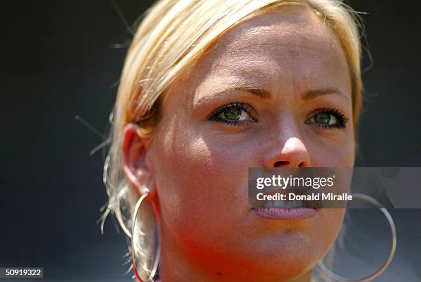 Jennie Finch, pitcher for the USA Women's Olympic Softball team looks on during the Padres 2-1 win in the 10th inning over the Colorado Rockies at...