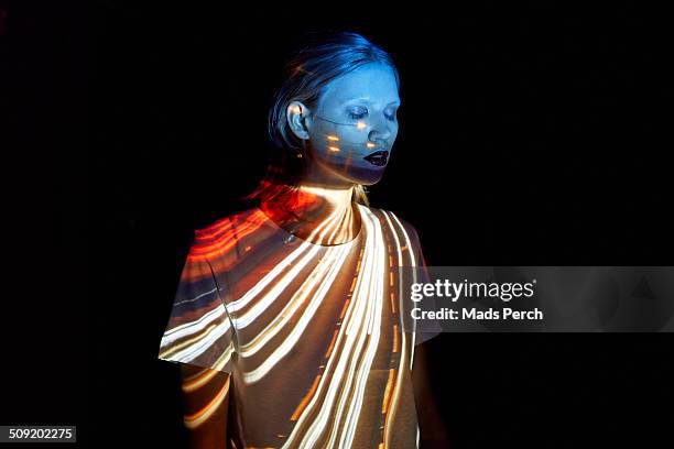 highway projected on to young woman - illuminated stock pictures, royalty-free photos & images