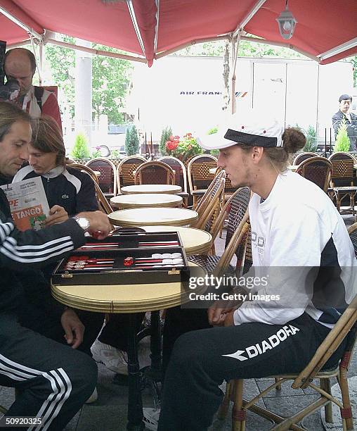 Gaston Gaudio of Argentina plays backgammon in Paris during Day Eleven of the 2004 French Open Tennis Championship at Roland Garros on June 3, 2004...